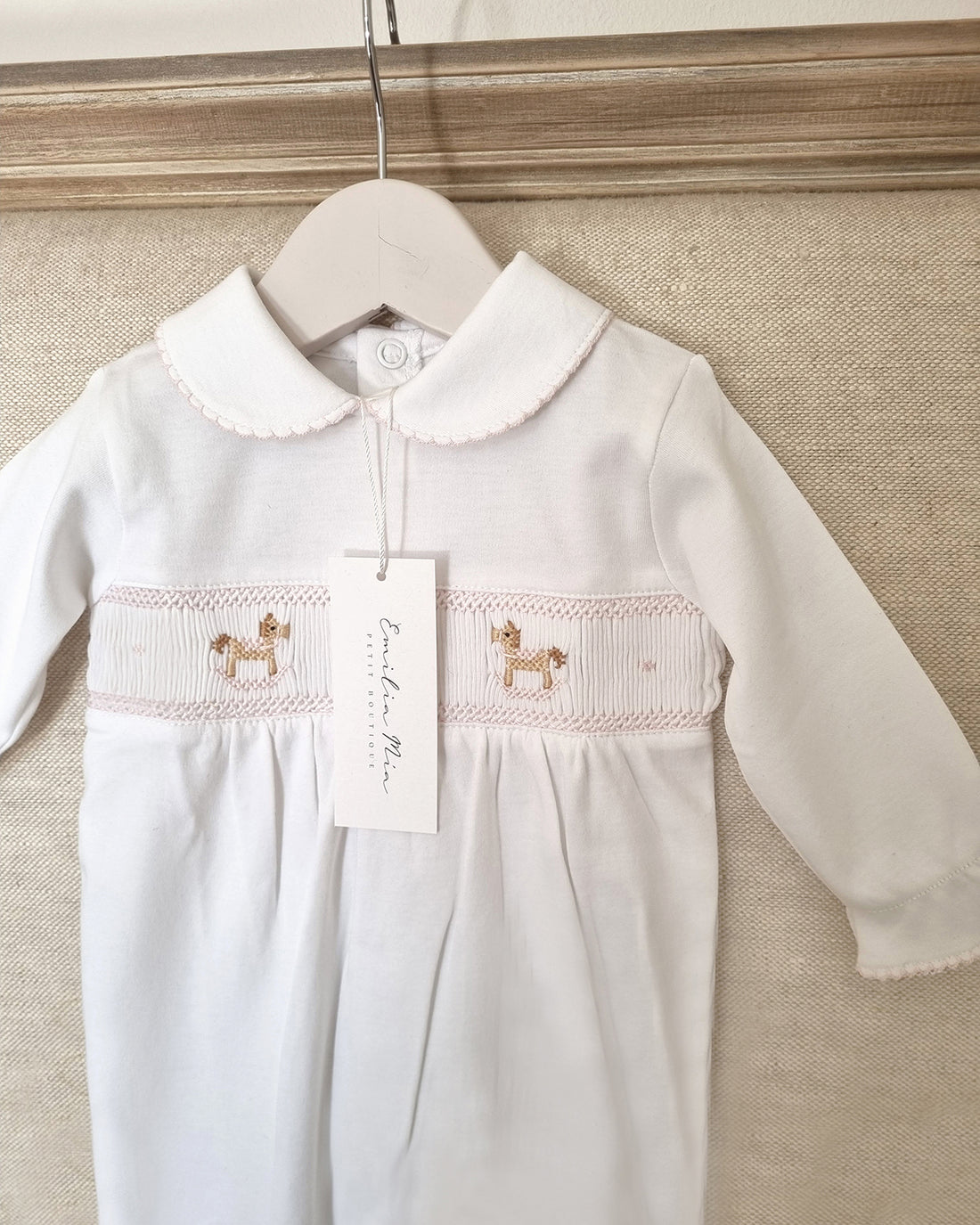 ENTERITO CABALLITO BORDADO ROSA